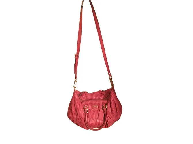 Coach Bolsos de mano Coral 