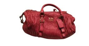 Coach Bolsos de mano Coral 